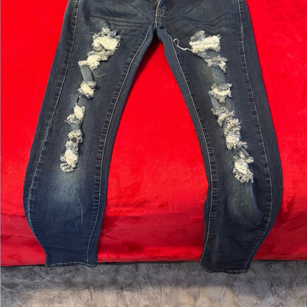 Distressed Blue Jeans